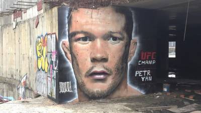 В Москве появилось граффити с изображением чемпиона UFC Петра Яна