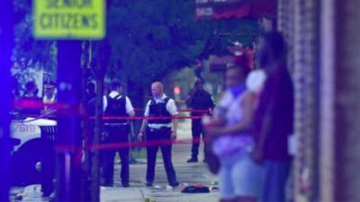 Число пострадавших при стрельбе на похоронах в Чикаго возросло до 14