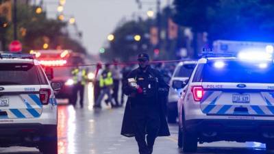 Полиция Чикаго: 14 человек пострадали в ходе стрельбы у похоронного бюро