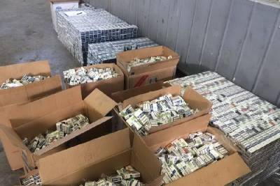 Смоленские таможенники нашли тайник с 283 тысячами пачек сигарет