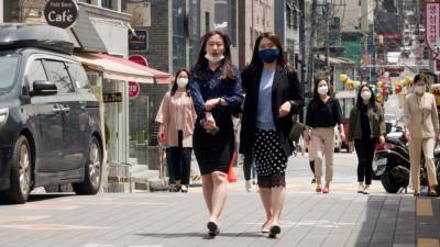 В Южной Корее предложили отменить бесплатное лечение от COVID-19 для иностранцев