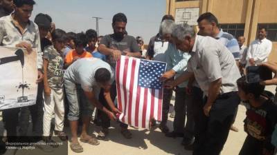 Сирийцы вышли на акцию в поддержку Асада и осудили военное вторжение США