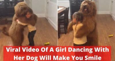Более 7,5 млн просмотров: танцующая с большим псом малышка покорила сеть