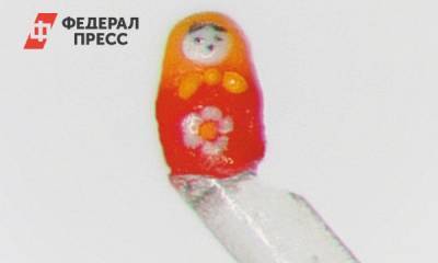 Новосибирский микроминиатюрист сделал самую маленькую матрешку в России