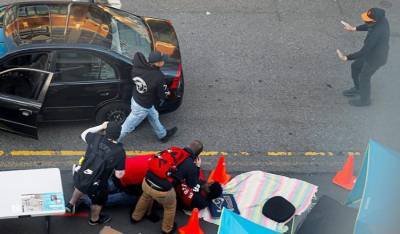 В Сиэтле в толпу демонстрантов въехало авто: одна женщина умерла