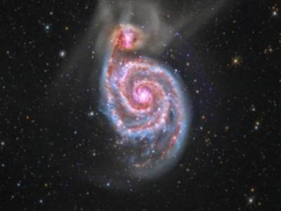 В объектив телескопа Hubble попала «сверхскоростная» спиральная галактика