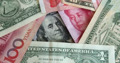 Китай пытается решить проблему нехватки долларов