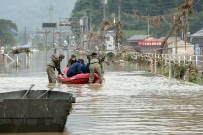 Число жертв наводнения в Японии выросло до 57