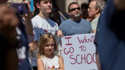 Трамп пригрозил лишить финансирования школы, если они не откроются осенью