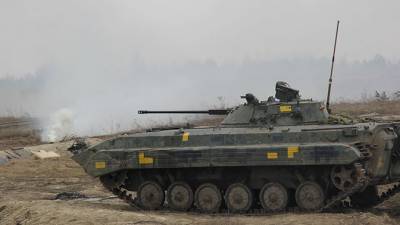 Украинские каратели разместили технику у трех поселков на Донбассе