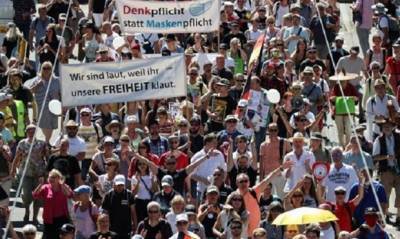 В Германии более 20 тысяч человек вышли на акцию против карантинных ограничений