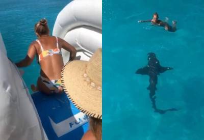Друзья сняли на видео, как девушка спускается с горки в море, где её уже поджидала акула