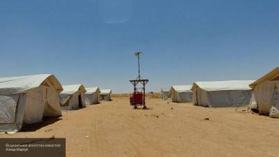 Военные США и боевики требуют деньги за выход беженцев из лагеря "Рукбан"
