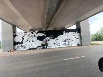 Масштабную картину начали создавать уличные художники под метромостом в Нижнем Новгороде