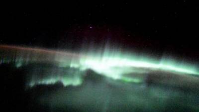 Космонавт из Петербурга поделился "космическими" фото северного сияния