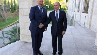 Путин подтвердил готовность помочь Лукашенко