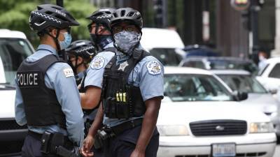 Чикаго: мирные демонстрации переросли в столкновения с полицией