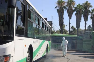Российские военные в Алеппо приступили к дезинфекции рейсовых автобусов