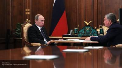 Путин и Сечин обсудили ситуацию в мировой экономике