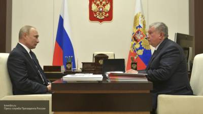 Путин обсудил с Сечиным работу "Роснефти"