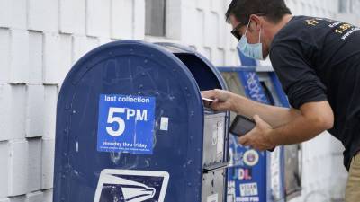 Трамп: массовое голосование по почте может сделать необходимым повторное голосование