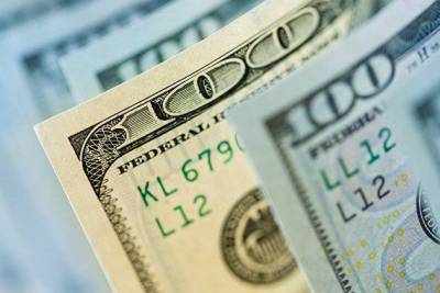 Доллар колеблется к мировым валютам на неопределенности вокруг экономики США