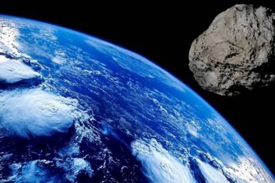 К Земле рекордно близко пролетел астероид 2020 QG, - астрономы