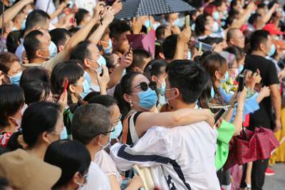Огромную пляжную вечеринку в Ухане оправдали в китайских СМИ