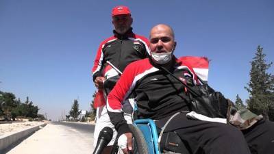 Ветеран сирийской армии совершил марш мира на инвалидной коляске