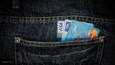 Владельцы карт Visa переходят на новую схему конвертации