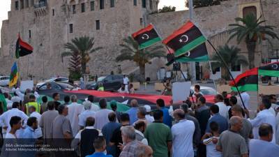 Боевики ПНС расстреливают мирных демонстрантов в Триполи