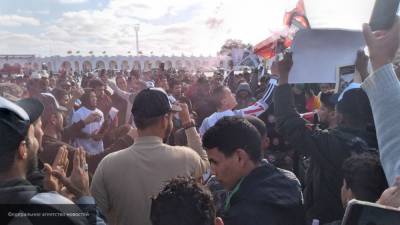 Футбольные фанаты участвуют в "Марше миллионов" против ПНС Ливии