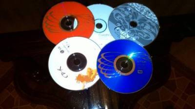 Использую старые CD диски вместо покупных подставок для горячего