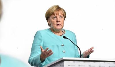 Ангела Меркель потрясена манифестацией в Берлине