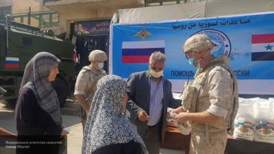 Жители сирийской Ходжиры получили гумпомощь от военных РФ