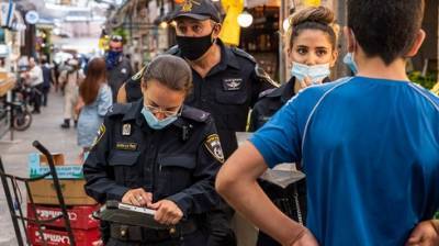 Штрафы из-за масок: в Тель-Авиве выписали сотни, в Иерусалиме ограничились предупреждениями