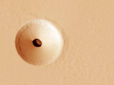 Будем жить в пещерах: Ученые нашли места на Марсе, где могут обосноваться земляне