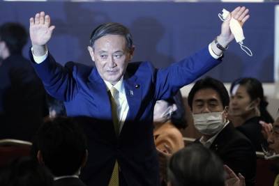 Новый лидер правящей партии Японии намерен продолжить курс Абэ