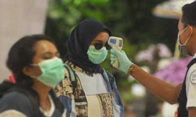 В Индонезии полиция привлечет главарей банд для контроля за ношением гражданами защитных масок