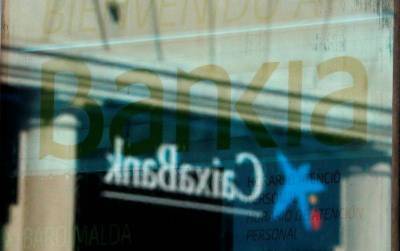 Основные акционеры Caixabank и Bankia дали зеленый свет их слиянию -- источники