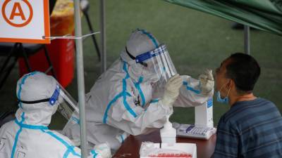 В КНР за сутки выявили 12 случаев заболевания коронавирусом