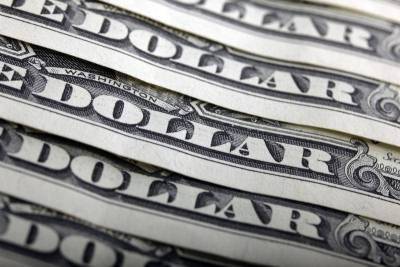 Средневзвешенный курс доллара США к российскому рублю со сроком расчетов "завтра" по состоянию на 11:30 мск 21 сентября составил 76,0381 руб.