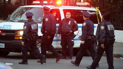 Сотрудника полиции Нью-Йорка обвиняют в сотрудничестве властями КНР