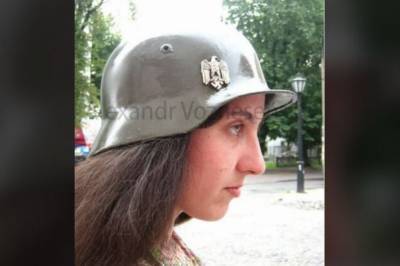 В каске со свастикой: В сети обсуждают скандальное фото чиновницы Госархива Украины