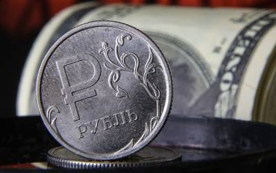Курс доллара: прогноз аналитиков Reuters по рублю может удивить