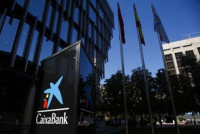 Испанские банки CaixaBank SA и Bankia SA обсуждают слияние