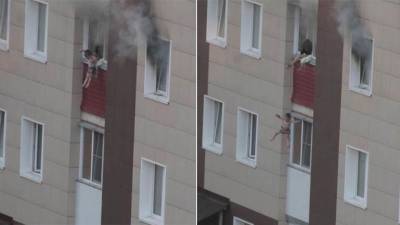 Очевидцы сняли невероятное спасение семьи с детьми из горящей квартиры