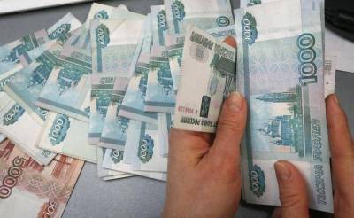 Fitch определило будущее рубля и экономики России