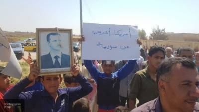 Сирийцы вышли на митинг в поддержку Асада против оккупации США и Турции