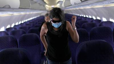В Японии самолет совершил экстренную посадку из-за пассажира без маски